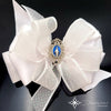 Virgin Mary (Miraculous Medal) Bow for Girls in White and Aurora Borealis Satin - Floreli + Devozioni