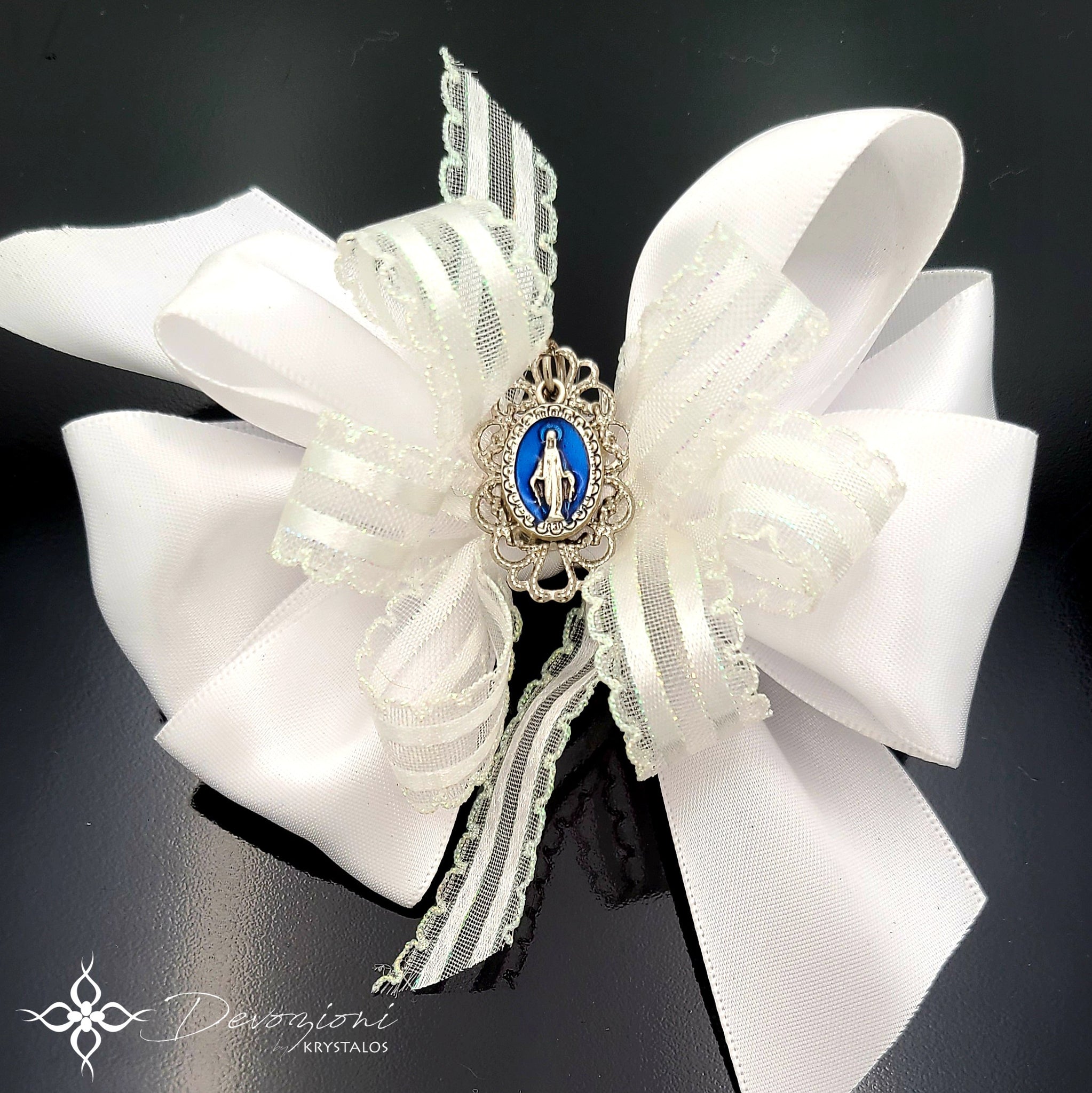 Virgin Mary (Miraculous Medal) Bow for Girls in White Satin and Aurora Borealis Lace - Floreli + Devozioni